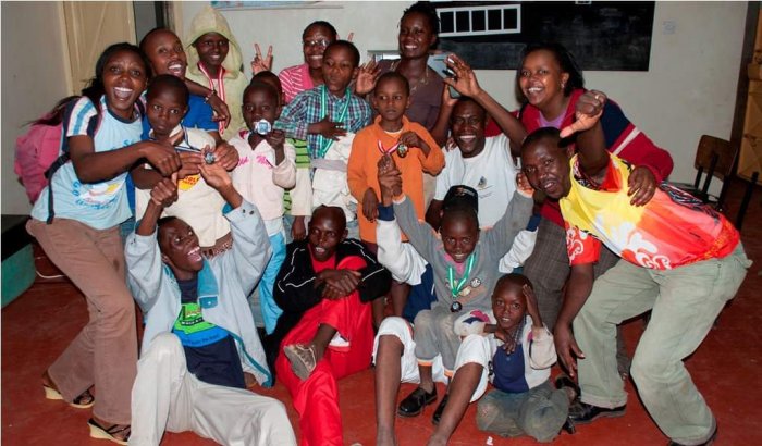 Haron Owalo in the community, near Kileleshwa
